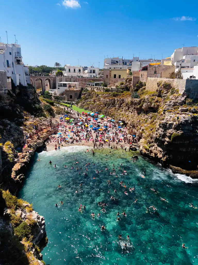 Aerial view of famous Lama Monachile beach in Polignano a Mare