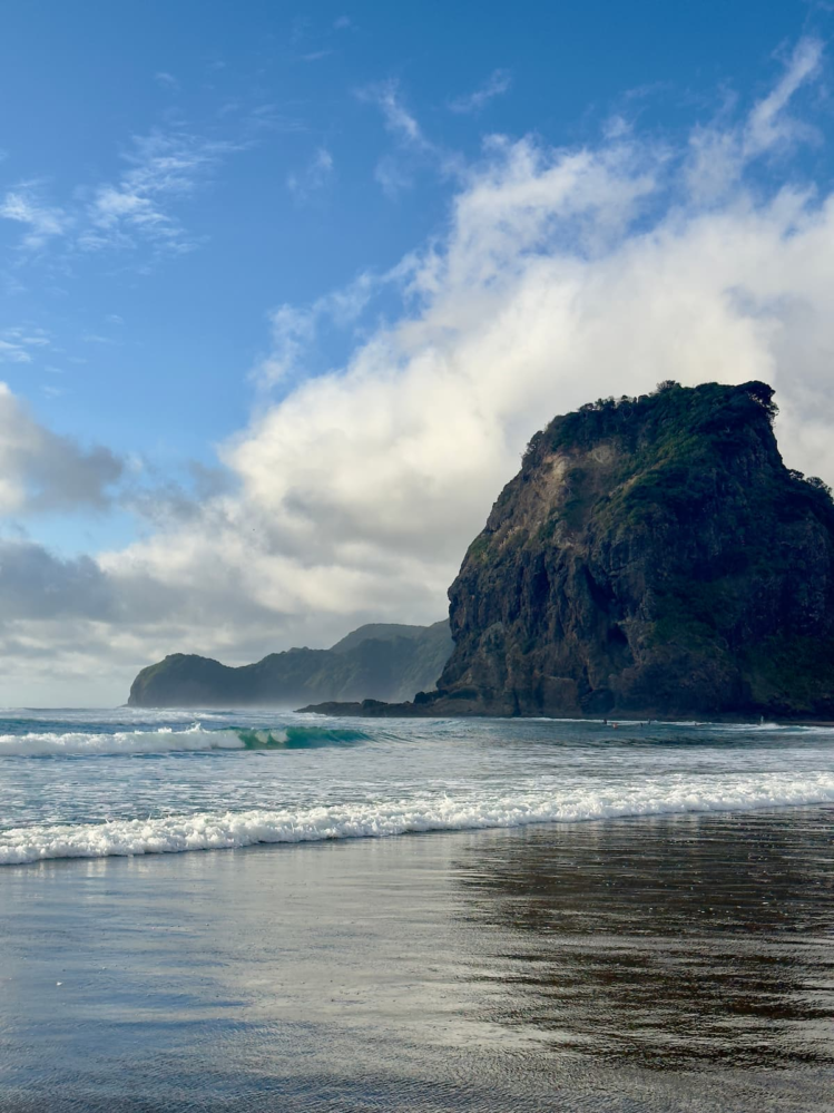 Lion Rock rising from the black sand of Piha Beach on Auckland’s west coast.